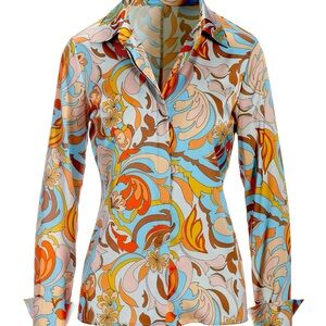 Button-up blouse with luxe French cuffs and a hidden button placket.